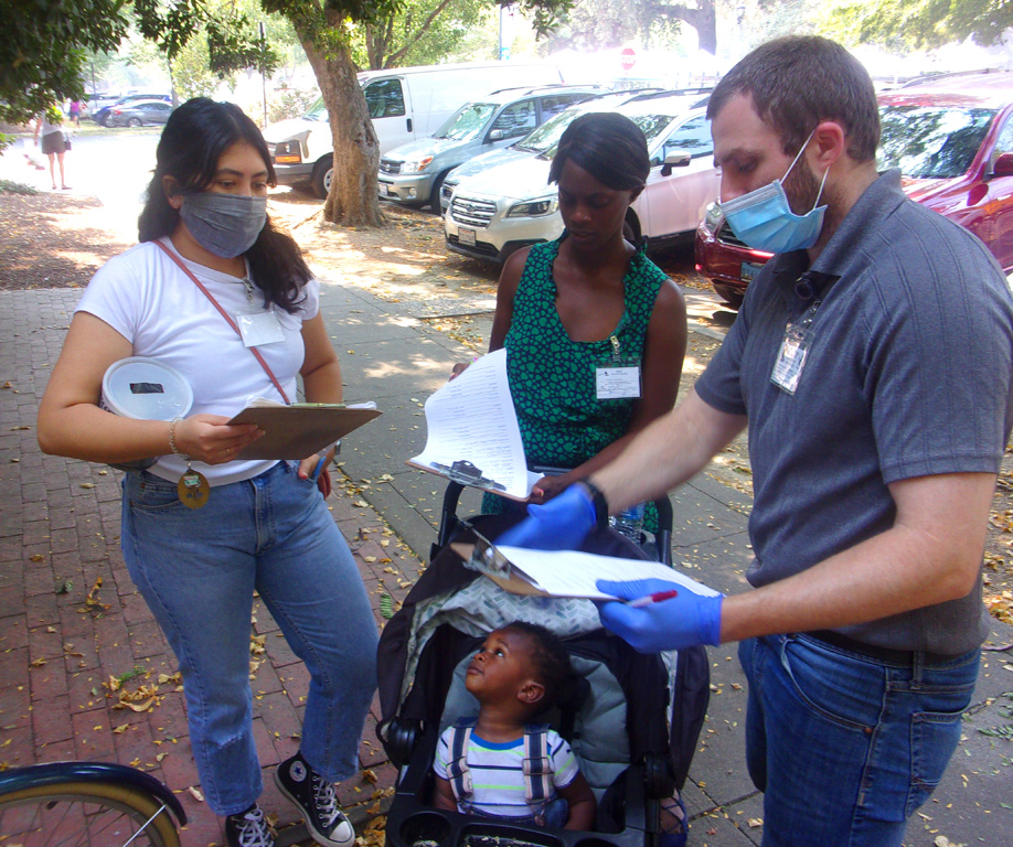 Photo of CCLP volunteers briefing on volunteer outreach activity